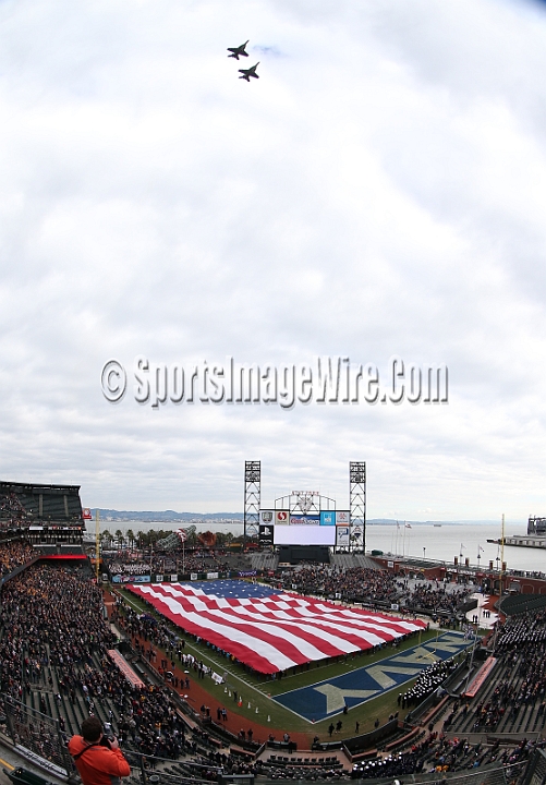 122912 Kraft SA-013.JPG - Dec 29, 2012; San Francisco, CA, USA; A Navy fighter jet flyover durig the national anthem before the 2012 Kraft Fighting Hunger Bowl at AT&T Park.